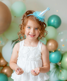 girl celebrating her birthday balloons background
